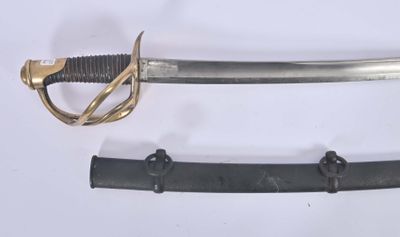 two different types of swords on display on a table