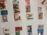 a refrigerator with a bunch of stamps on it