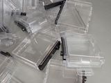 a pile of plastic containers sitting on a table
