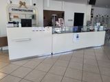 a picture of a counter in a store with a lot of counter space