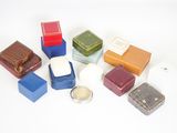 a lot of different colored boxes on a white surface