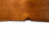 a piece of wood that has been cut in half