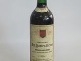 a bottle of wine that is sitting on a table