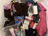 a plastic bag full of clothes and other items