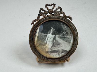 a picture of a woman in a white dress in a picture frame