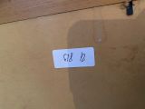 a label on the bottom of a suitcase that says mr d