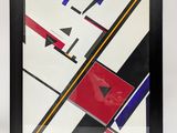 a black frame with a red, white, and blue abstract painting