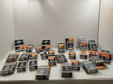 a lot of cassettes on a table in a room