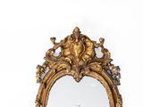 a mirror that is sitting on the wall in the room