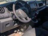 a picture of the interior of a vehicle with a steering wheel and dashboard