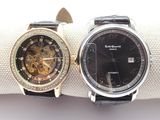 two watches that are sitting next to each other