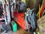 a picture of a bunch of tools and equipment in a garage