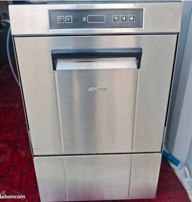 an image of a stainless steel dishwasher in a kitchen
