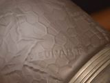 a close up of a glass jar on a table