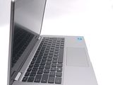 a close up of a laptop computer on a white surface