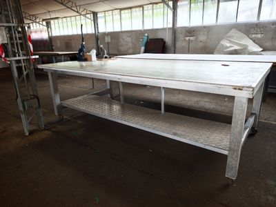 a table that is sitting in the middle of a room
