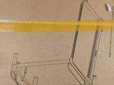 a cardboard box with a drawing of a chair on it