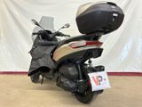 a motorcycle that is parked in a garage
