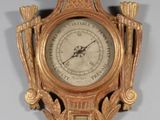 a clock that is hanging on the wall in the room