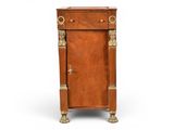an antique wooden cabinet with brass handles and a door