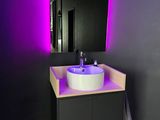 an image of a bathroom with a sink and a mirror