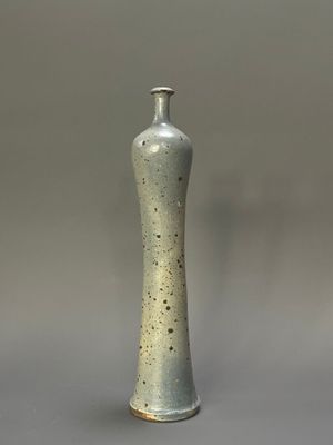a small vase that is sitting on a table