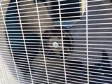 an air conditioner that is sitting on top of a table