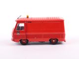 a red toy truck with a red roof on a white surface