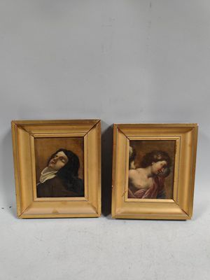 two framed paintings of a man and a woman in a gold frame