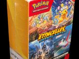 the box contains a pokemon trading card game with a box of cards