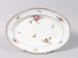 a white plate with a floral design on it