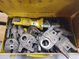 a box full of tools that are sitting on the floor