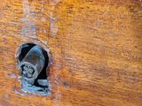 a close up of a piece of wood with a hole in it