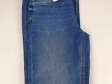 a pair of blue jeans on a white background