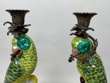 two vases that have green and yellow birds on them