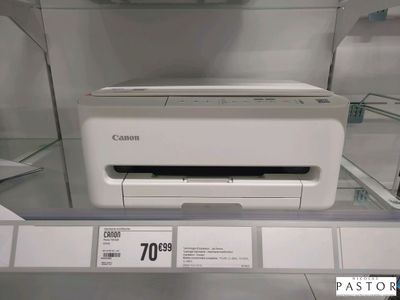 une photo d'une imprimante Canon exposée dans un magasin