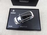 a toy car that is in a box on a table