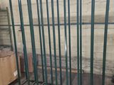 a large metal cage in the middle of a room
