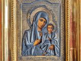 an image of a painting of a woman holding a child