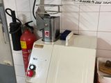 a machine that is sitting on a counter in a kitchen