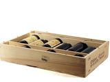 a wooden box with three bottles of wine in it
