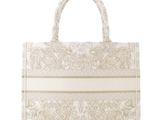 an image of a white and beige handbag on a white background