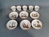 six tasses et soucoupes ornées d'une illustration représentant un bateau