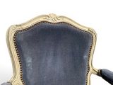 an image of a chair with a blue upholstered seat