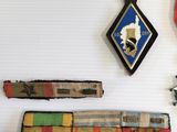 many different items displayed on the wall in this room