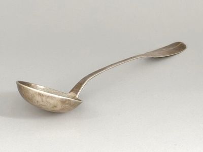 a spoon that is sitting on a table
