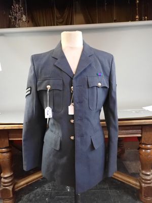 a mannequin wearing a military uniform on a table