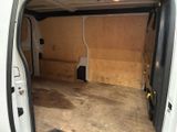 a white van that is parked inside of a building