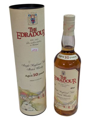 an image of a bottle of the edradour whisky next to a cardboard box