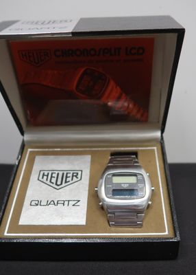 a watch that is in a box on a table